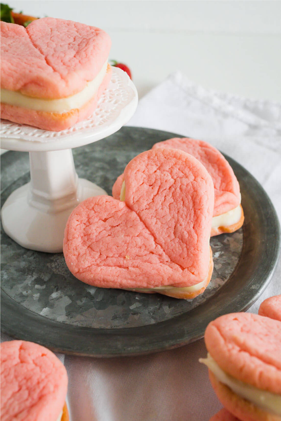 Strawberry Cake Mix Cookies with Cream Cheese Frosting - make these delicious cookies from a cake mix in no time flat! www.thirtyhandmadedays.com