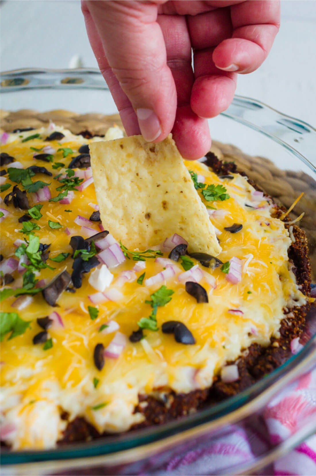 Chile Verde Layered Bean Dip - this bean dip recipe isn't your typical one. It has a little kick and a whole lot of flavor. www.thirtyhandmadedays.com 