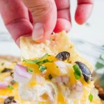 Layered Bean Dip - this bean dip recipe isn't your typical one. It has a little kick and a whole lot of flavor.