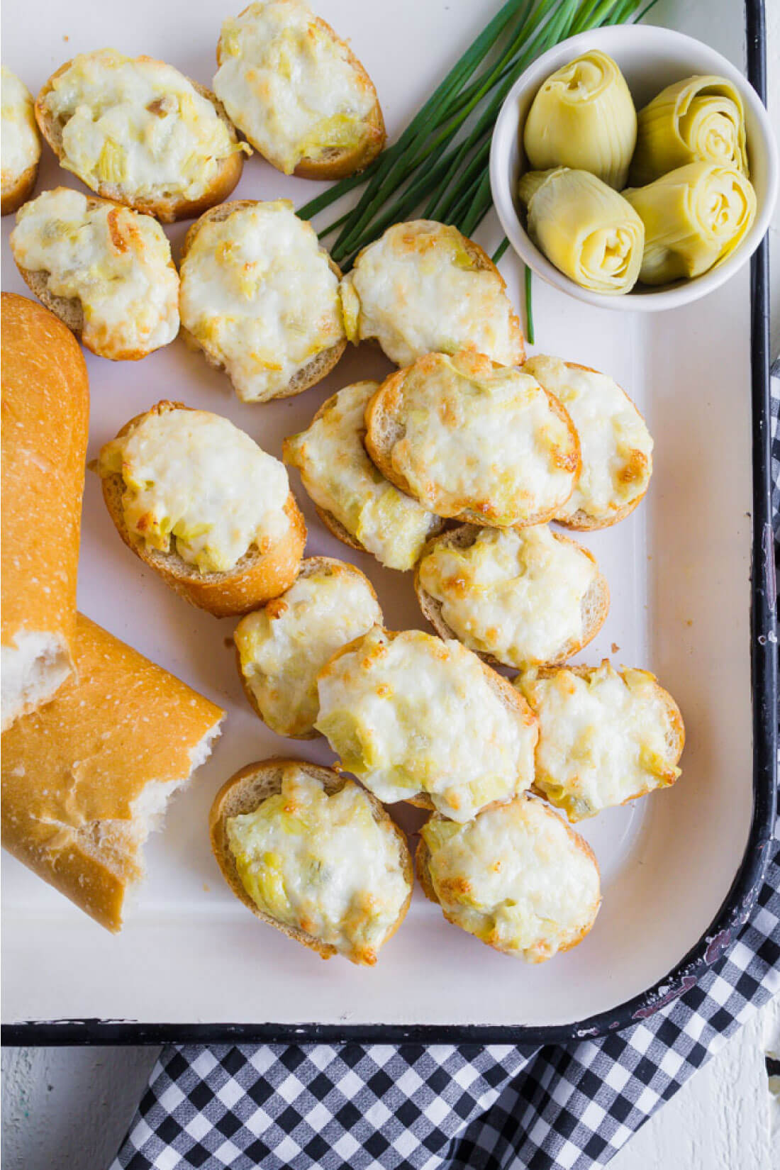 Artichoke Cheese Bread - an easy to make, delicious appetizer! On a tray.