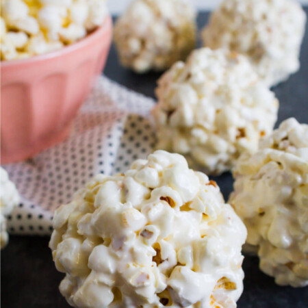 the Easiest Popcorn Balls Ever - you only need a few ingredients to make them! from thirtyhandmadedays.com