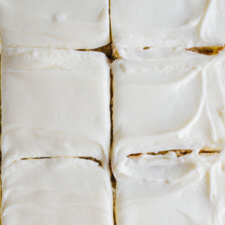 Frosted Banana Bars Recipe - use overripe bananas to make this recipe with cream cheese frosting. Yum!