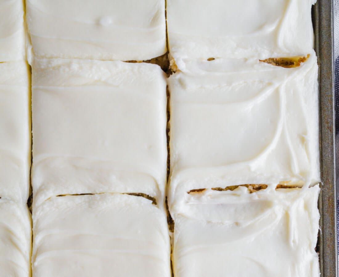 Frosted Banana Bars Recipe - use overripe bananas to make this recipe with cream cheese frosting. Yum!