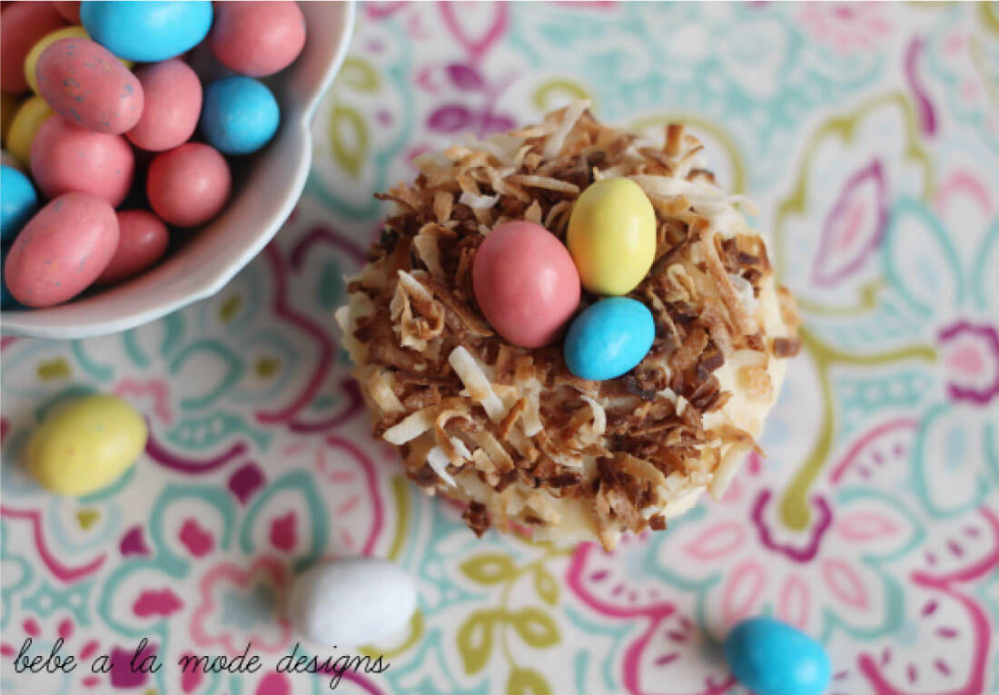 Coconut Cupcakes with Malted Buttercream Frosting - a divine dessert that's perfect for spring. Up close cupcakes