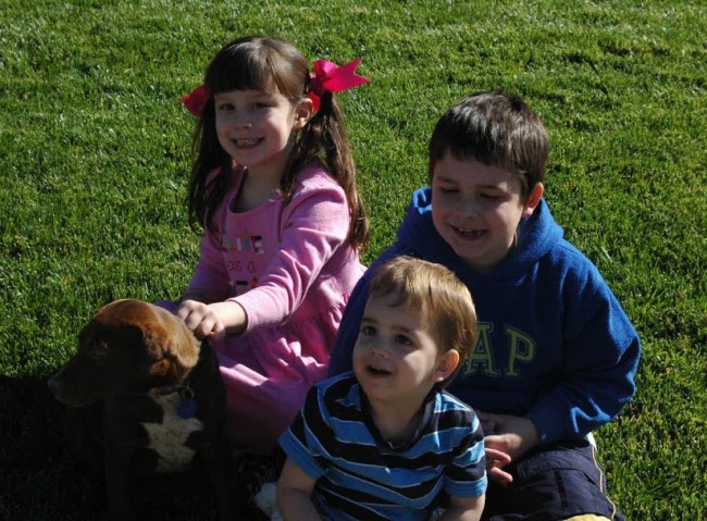 3 kids with our dog