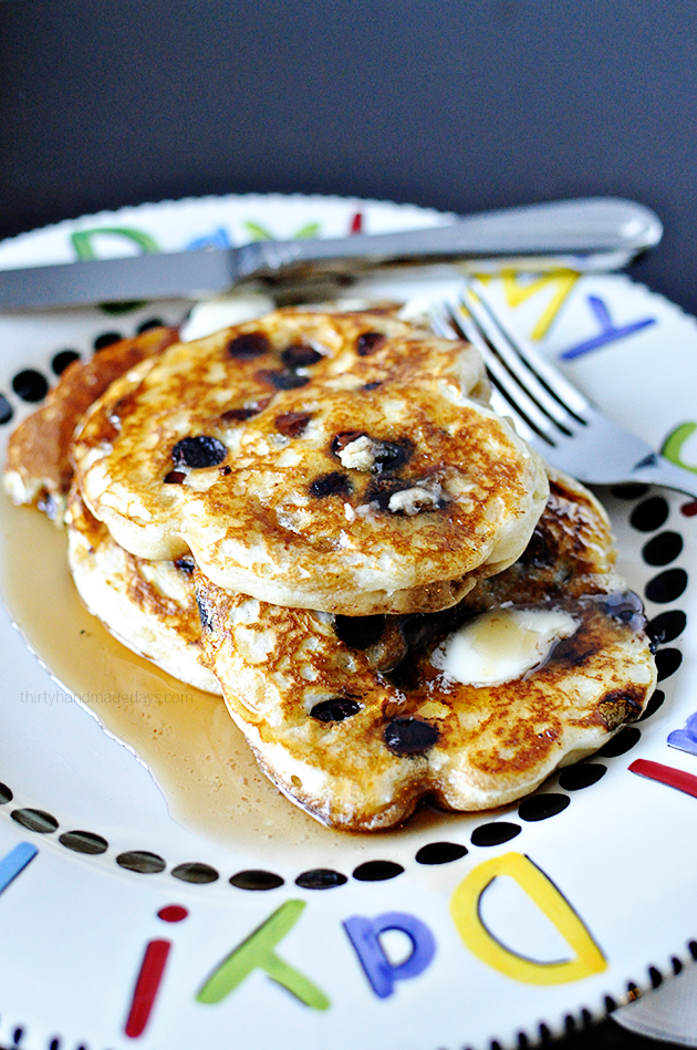 All Time Favorite Milk Chocolate Chip Pancakes - they are so good and fluffy! A must try recipe. www.thirtyhandmadedays.com