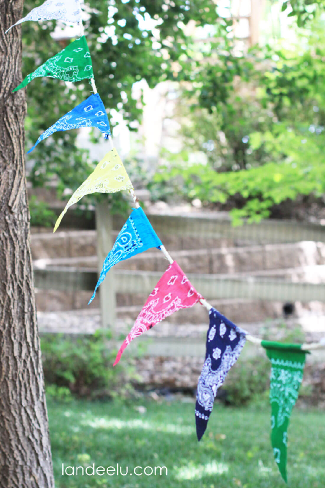 Easy DIY Bandana Party Banner  - hanging bandana banners.