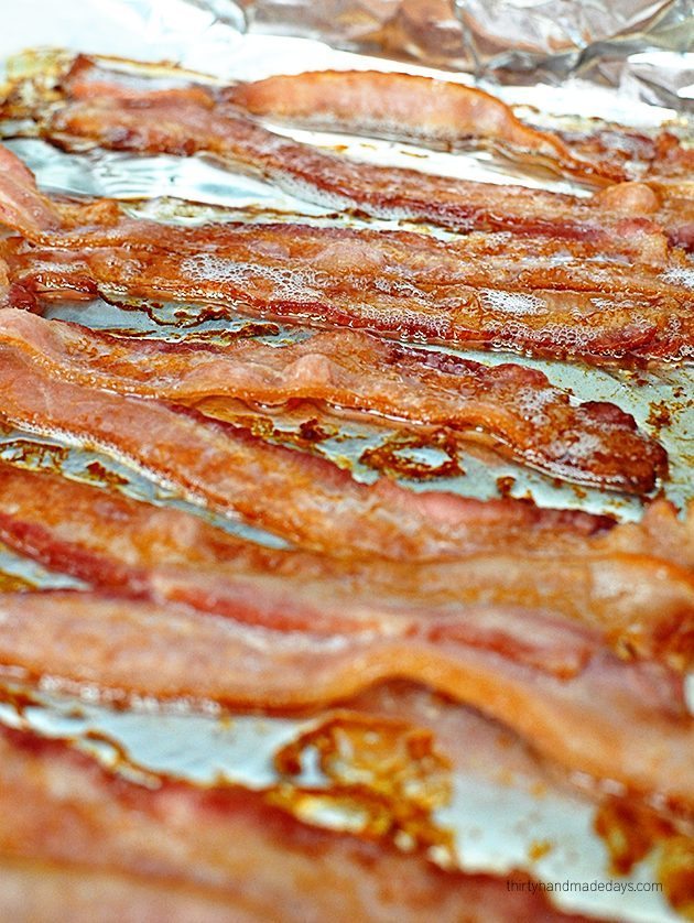 The easiest way to make bacon - in the oven! So simple and tastes fabulous.  www.thirtyhandmadedays.com