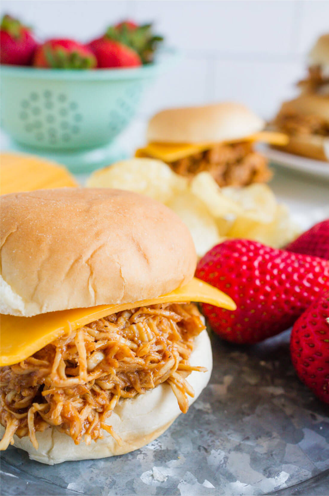 Crockpot Buffalo Chicken Sliders - make this in the slow cooker and your family will love it! via www.thirtyhandmadedays.com