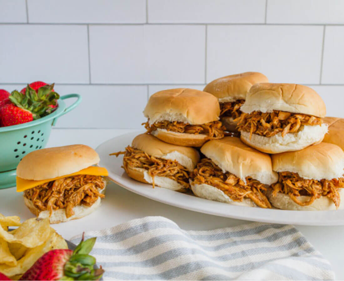 Crockpot Buffalo Chicken Sliders - make this in the slow cooker and your family will love it! 