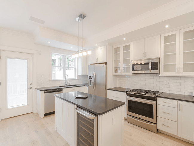 Kitchen featuring subway tiles from CliqStudios