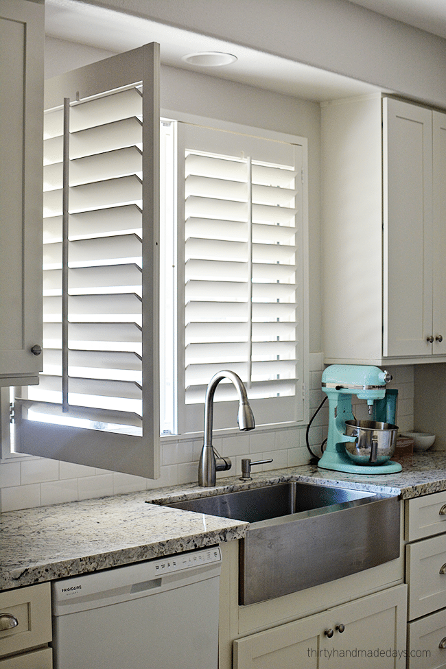 Kitchen with plantation shutters www.thirtyhandmadedays.com