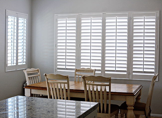 Plantantion Shutters in our kitchen www.thirtyhandmadedays.com