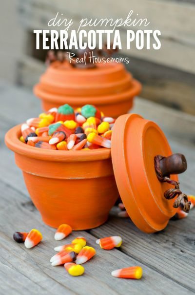 DIY Pumpkin Terracotta Pots / by Real Housemoms / Round up on Thirty Handmade Days