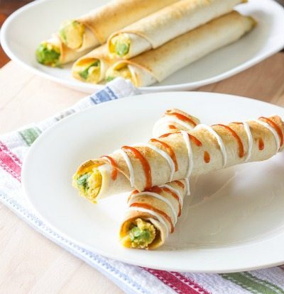 Avocado-Hummus-Taquitos by The Wholesome Dish / round up on ThirtyHandmadeDays.com