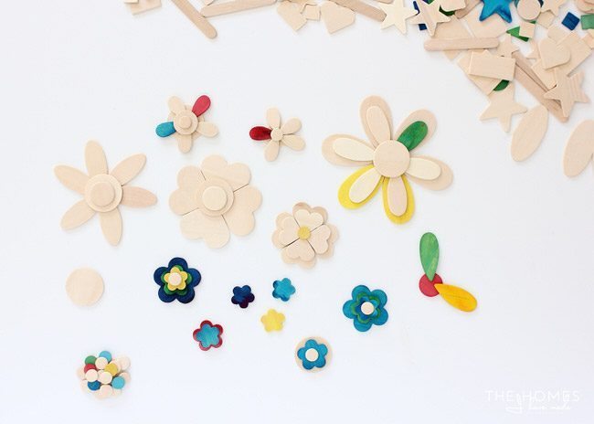 Use a variety of wooden shapes to create adorable flower cake toppers!