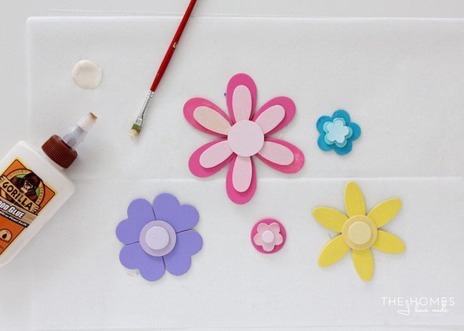 Use a variety of Springtime paint colors to create adorable flower cake toppers!