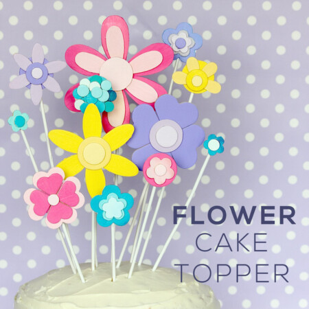 Glue and paint wooden shapes together to create a darling flower display...perfect for adorning a cake for any Springtime occasion!