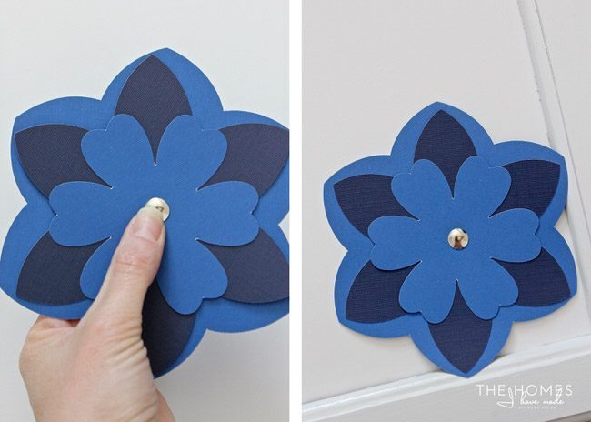 With a stack of colorful cardstock (and a scissors or e-cutter!) you can make inexpensive, easy, and eye-popping flower artwork for anywhere in your home!