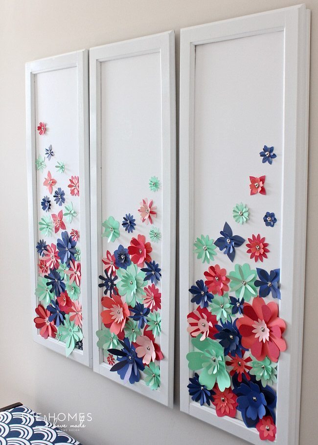 With a stack of colorful cardstock (and a scissors or e-cutter!) you can make inexpensive, easy, and eye-popping flower artwork for anywhere in your home!