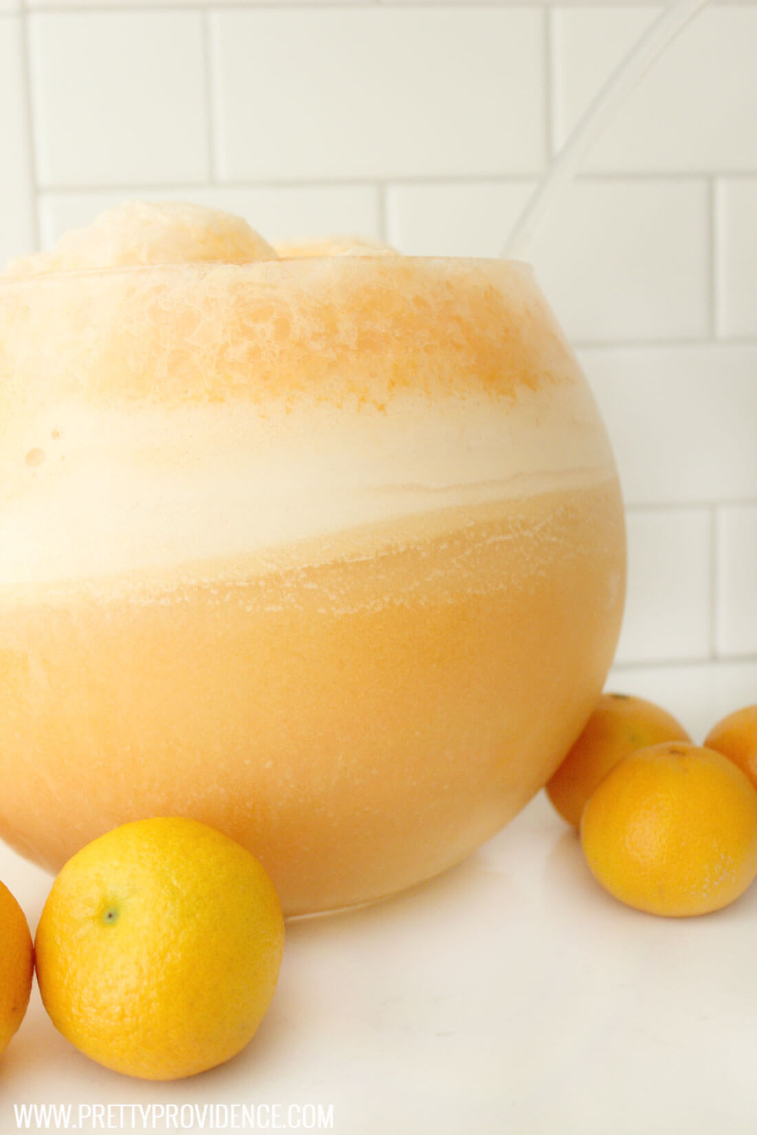 Orange Slush - a super refreshing drink recipe that is sure to hit the spot! The whole slush bowl. 