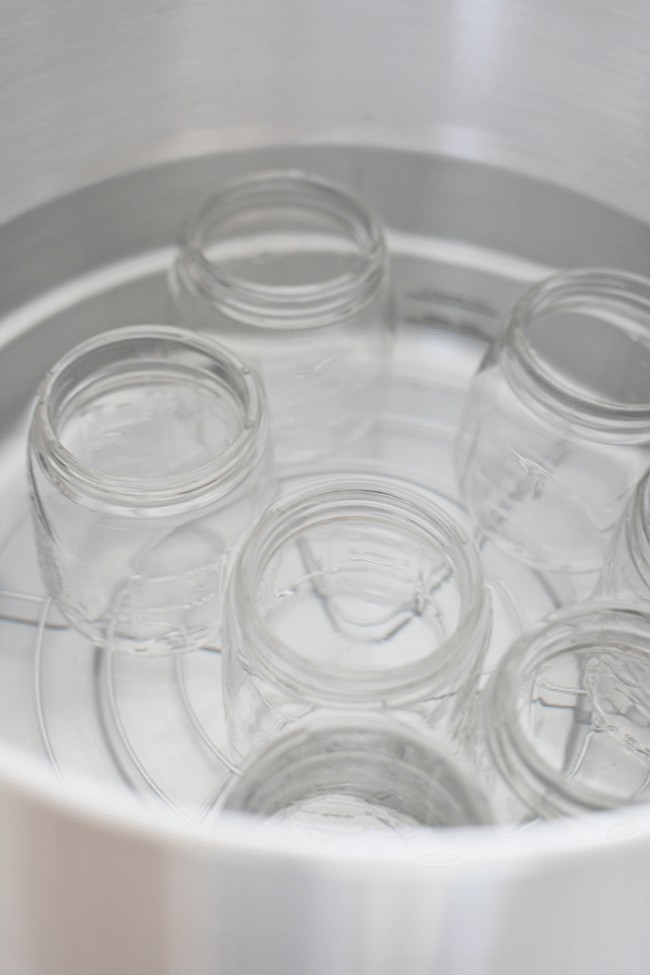 The process of canning - heating the jars in the electric canner. 
