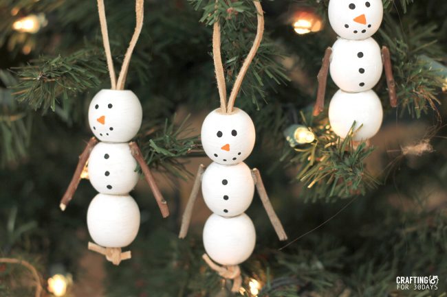 Holidays: Wooden Snowman Ornaments - fun activity for Christmas with your kids! From CraftingE 