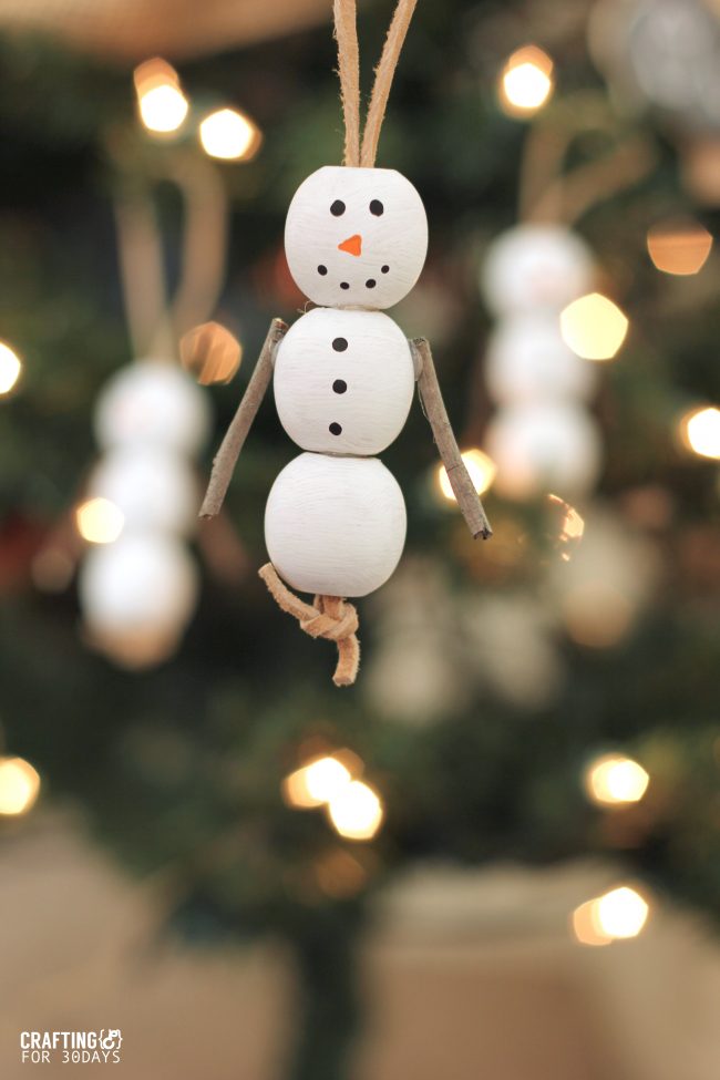 Holidays: Wooden Snowman Ornaments - fun activity for Christmas with your kids! From CraftingE  via thirtyhandmadedays.com