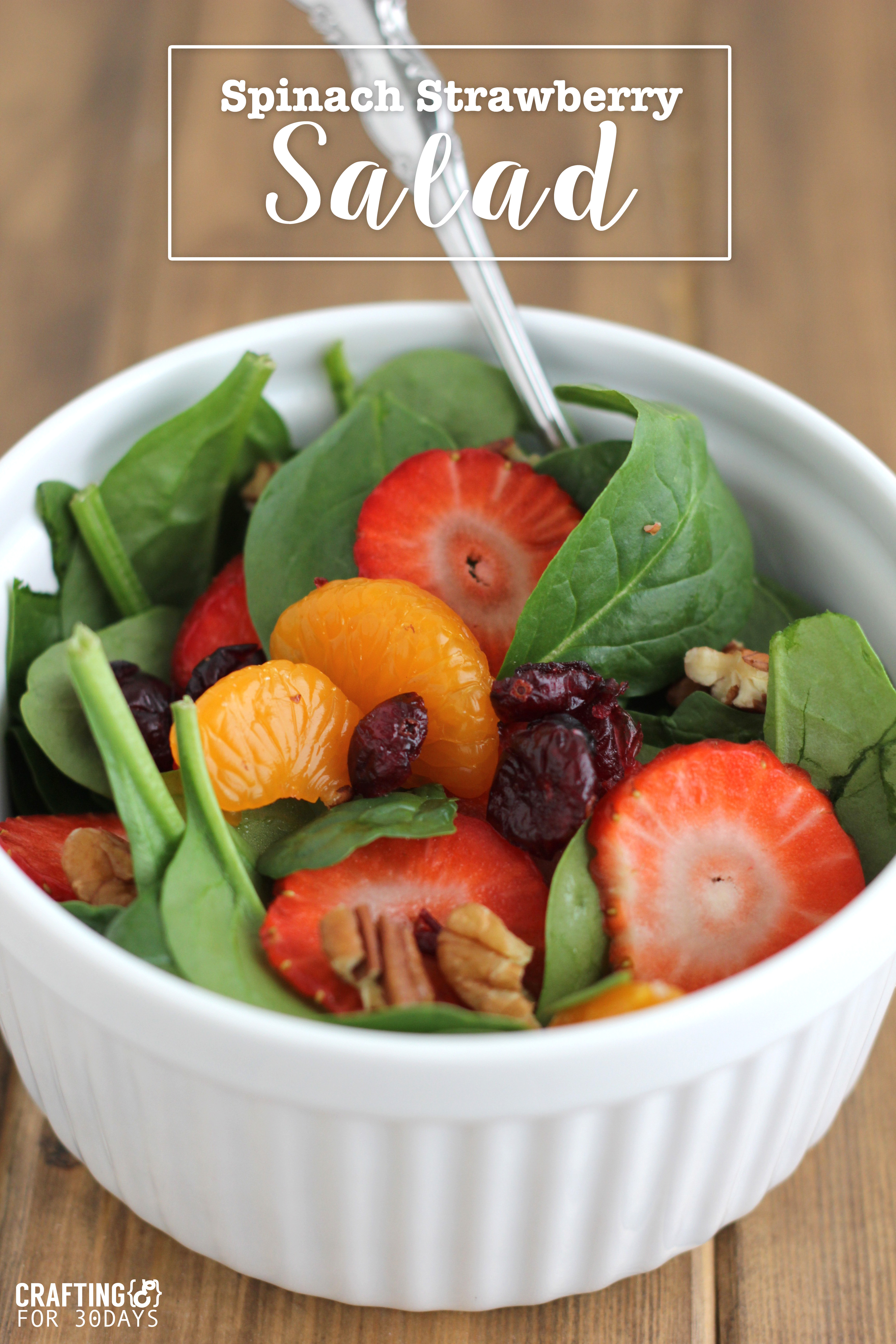 Spinach Strawberry Salad- an awesomely delicious and healthy option for the new year! From CraftingE