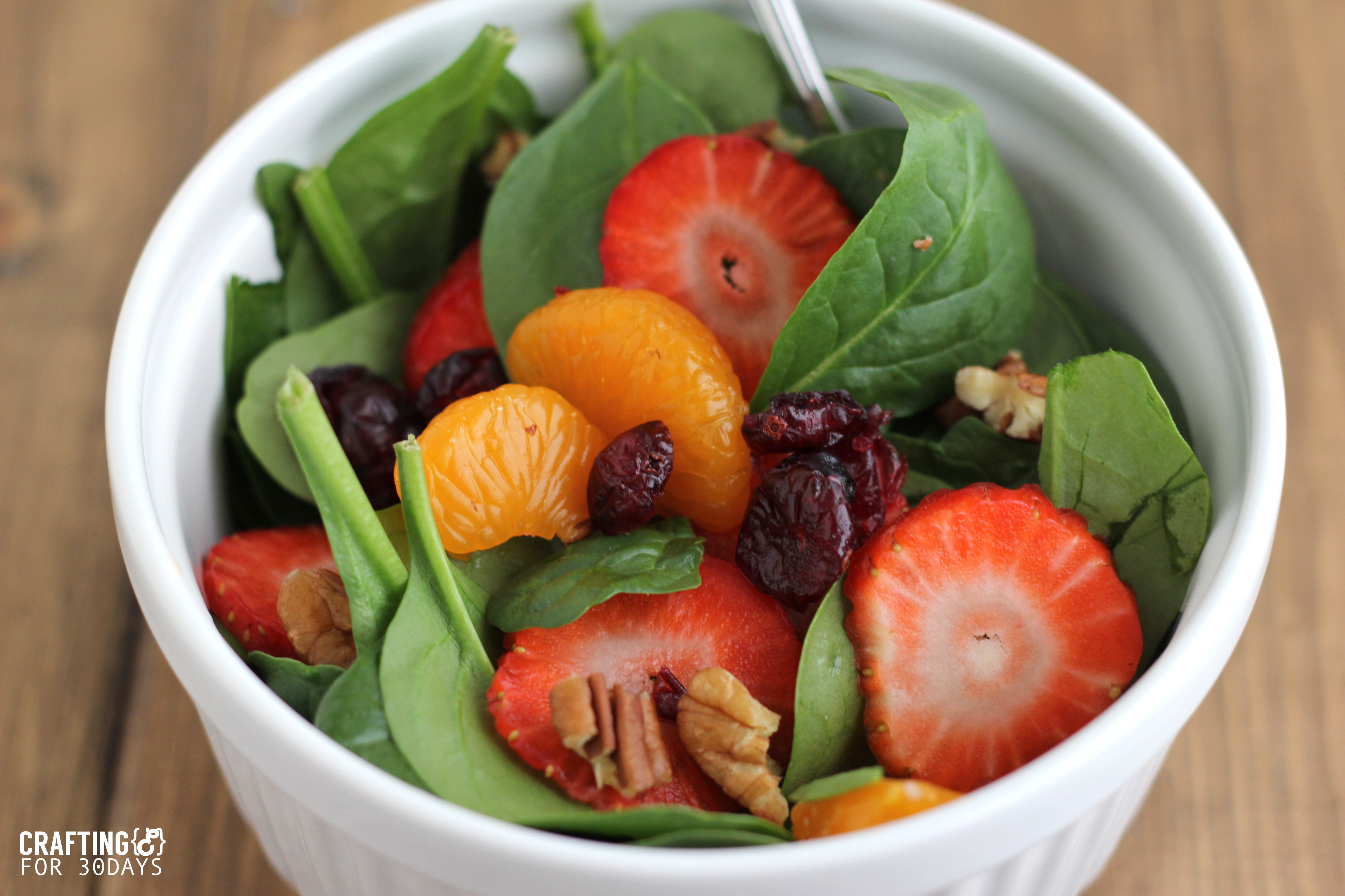 Spinach Strawberry Salad- an awesomely delicious and healthy option for the new year! From CraftingE via www.thirtyhandmadedays.com