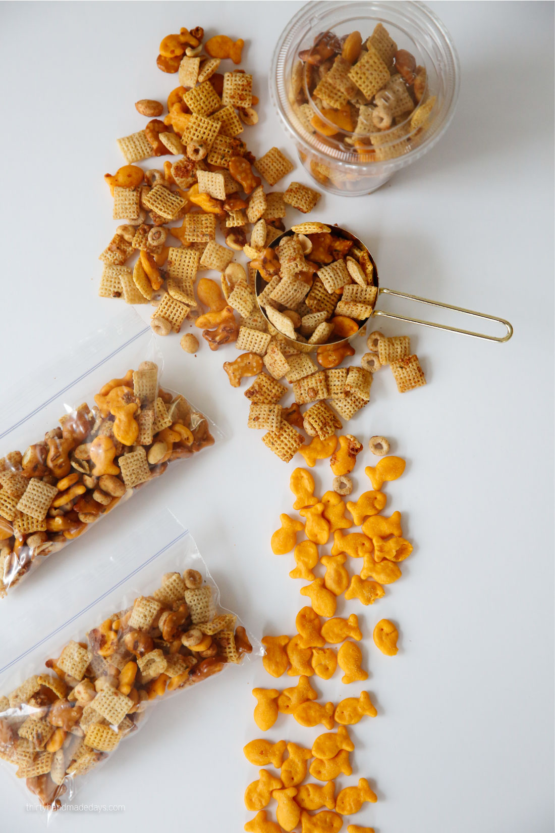 Zesty Ranch Goldfish Mix - combining a few of our favorites for this yummy mix. SO easy the kids can get involved! How to package.