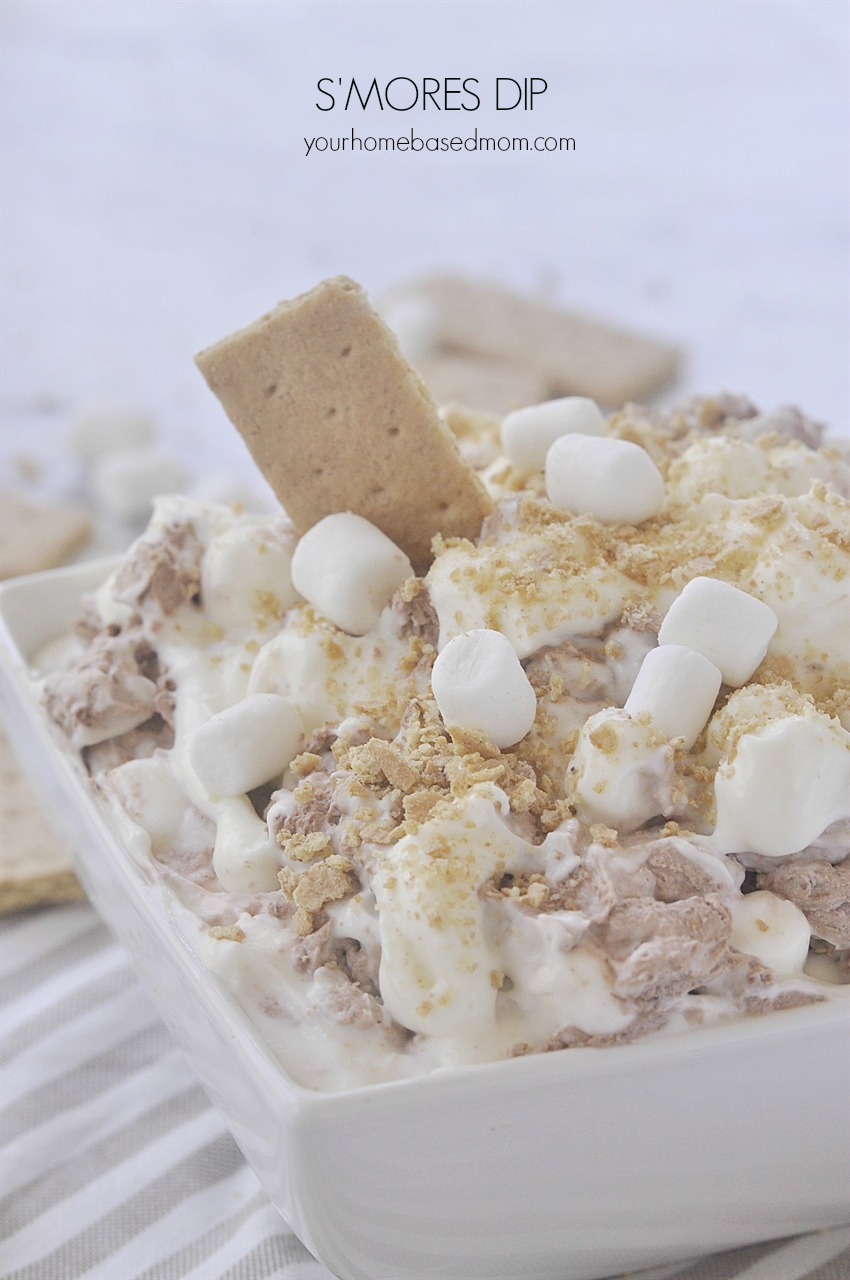 S'mores Dip is a fun way to enjoy all the flavor of a traditional s'mores without a fire! A swirl of marshmallow and a swirl of chocolate.