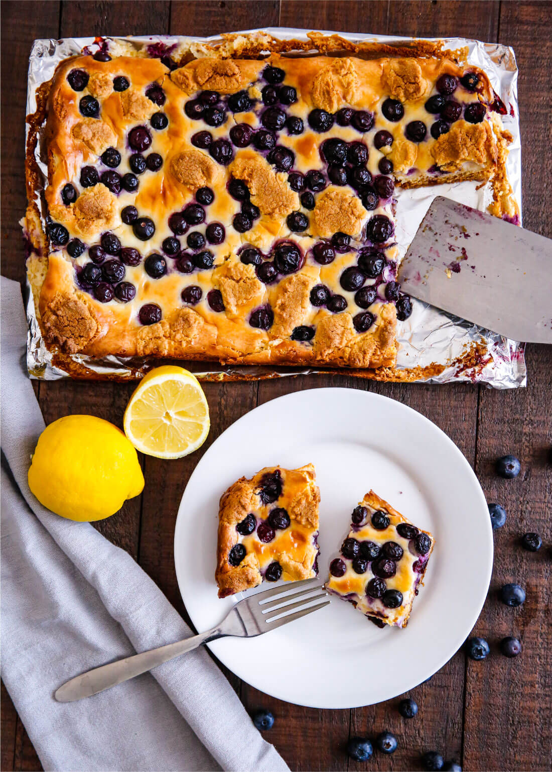 Food: Blueberry Lemon Cheesecake Bars - try this simple and delicious recipe! You'll have a hard time stopping at one piece. from thirtyhandmadedays.com