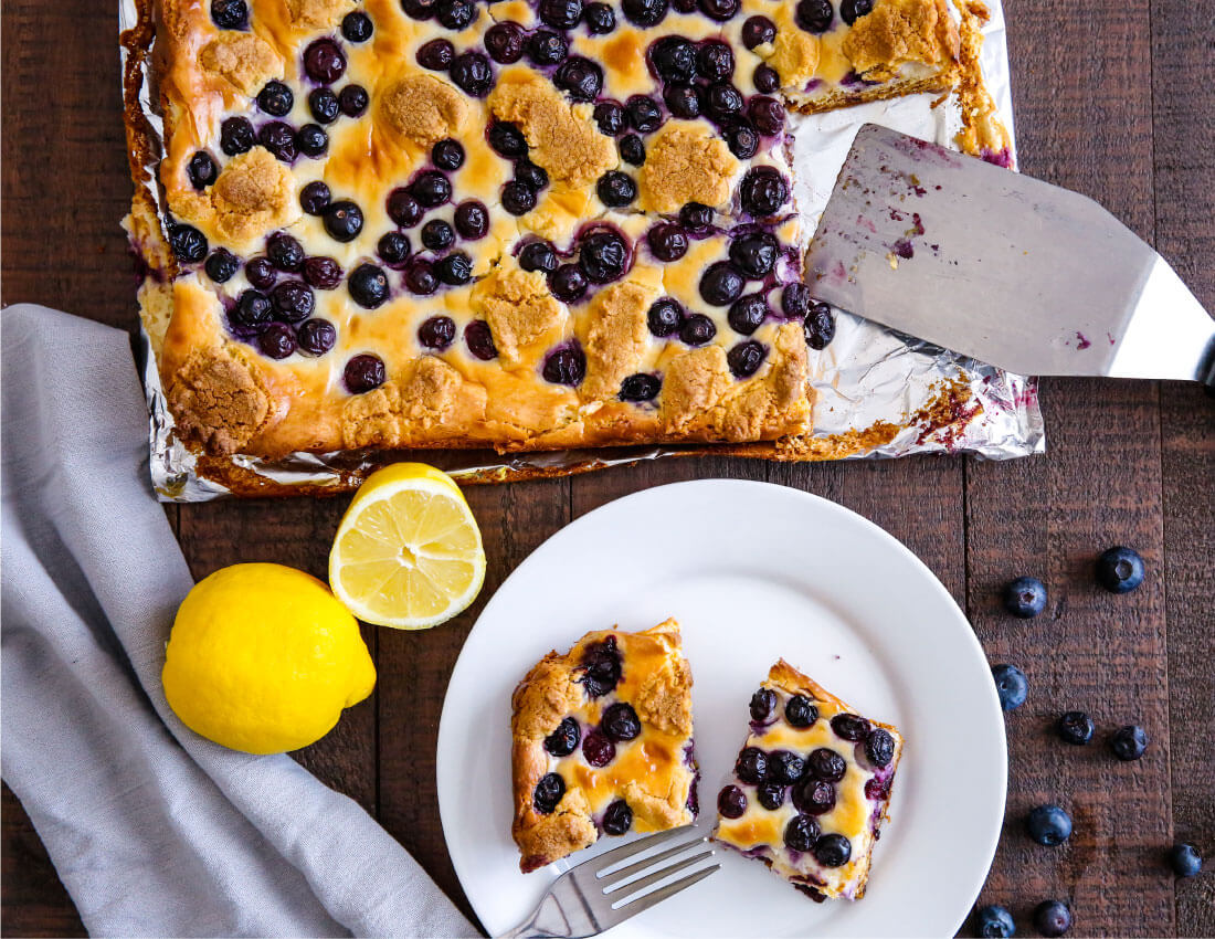 Blueberry Lemon Cheesecake Bars - try this simple and delicious recipe! You'll have a hard time stopping at one piece. from thirtyhandmadedays.com