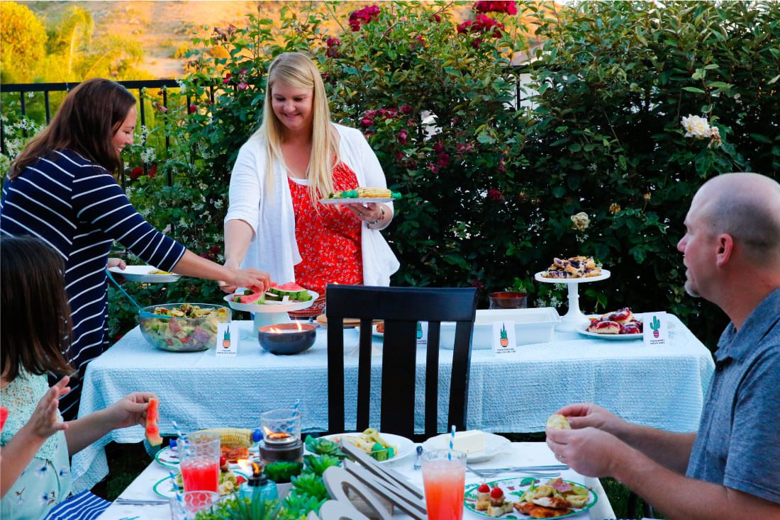 Eating dinner at our summer party