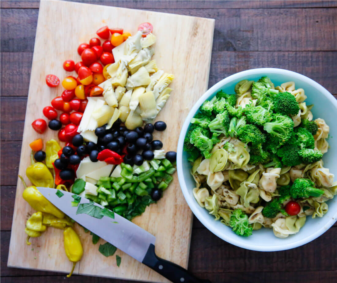 An awesome Italian salad with tortellini, vegetables meats and cheese. This Italian Tortellini Salad will be a huge hit wherever you take it! Perfect potluck dish. Ingredients for the recipe. 