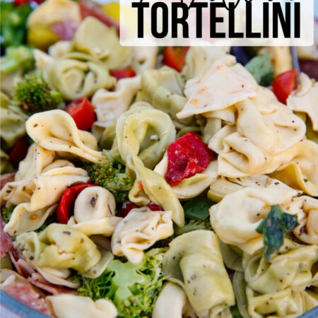 An awesome Italian salad with tortellini, vegetables meats and cheese. This Italian Tortellini Salad will be a huge hit wherever you take it! Perfect potluck dish. www.thirtyhandmadedays.com