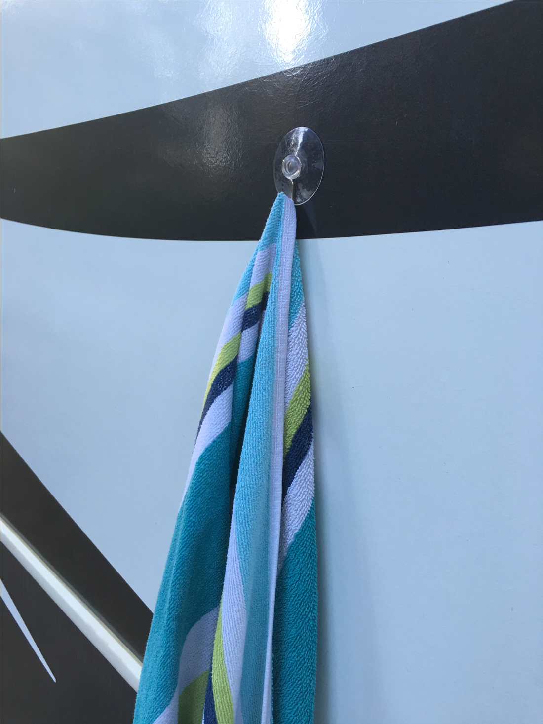 Hang towels on the RV with suction cup hooks
