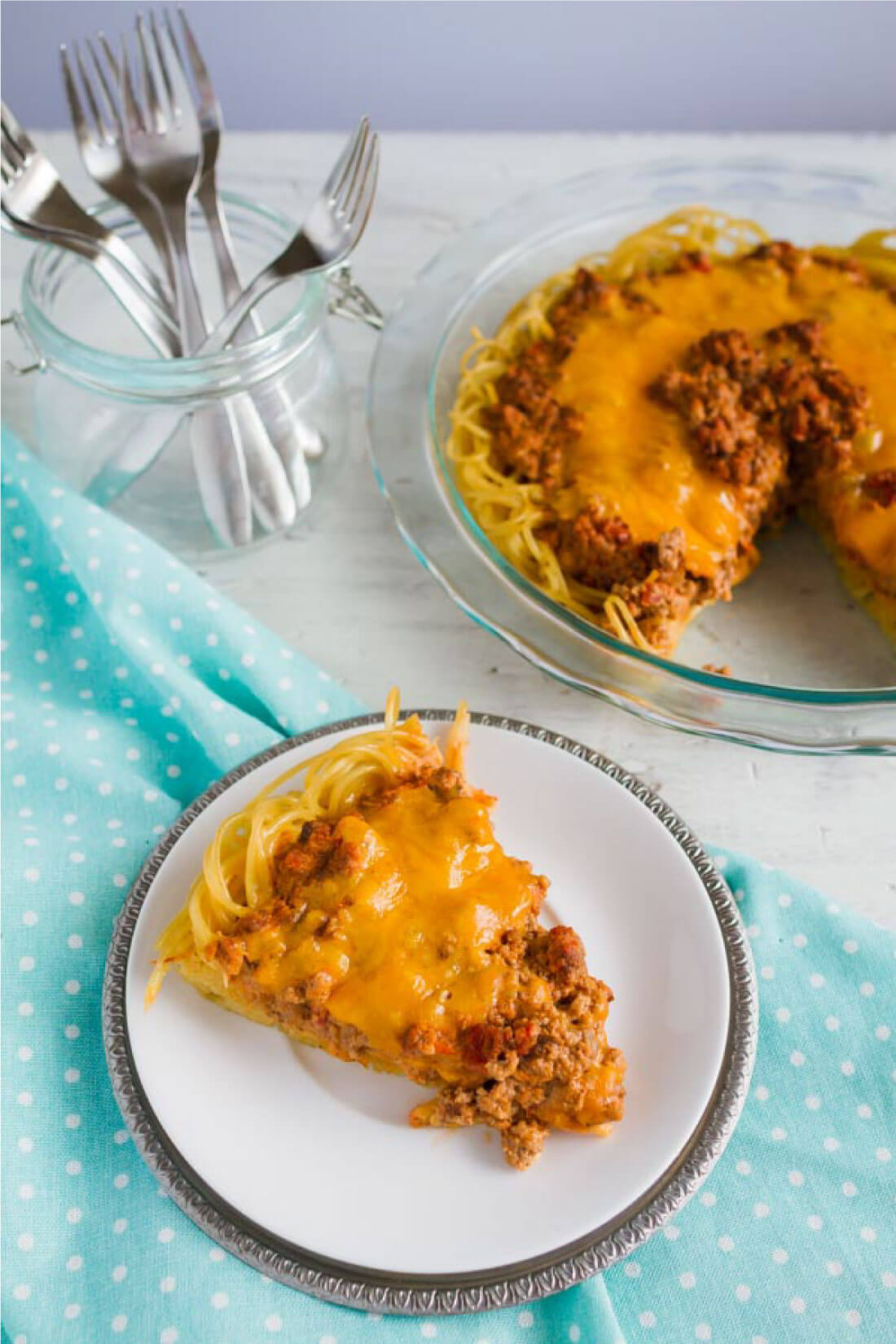 Baked Spaghetti Pie - an easy take on spaghetti with a kick from thirtyhandmadedays.com