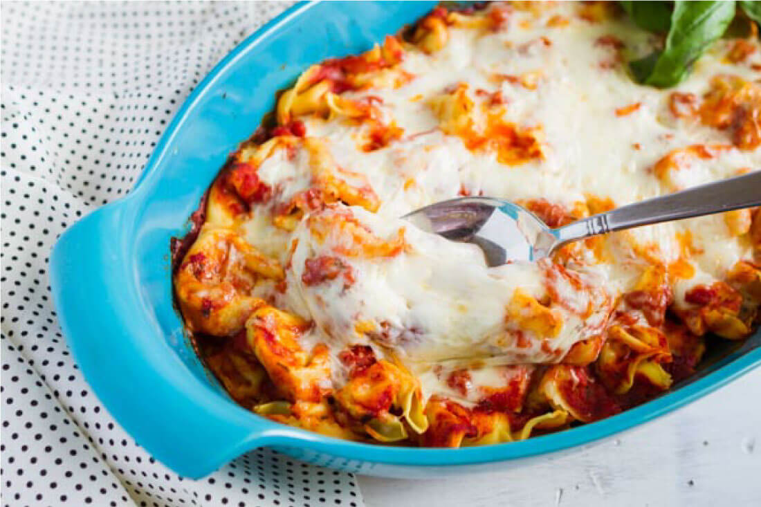 Super simple but tasty Baked Tortellini - if your family likes pasta, they will love this ooey gooey main dish! via www.thirtyhandmadedays.com