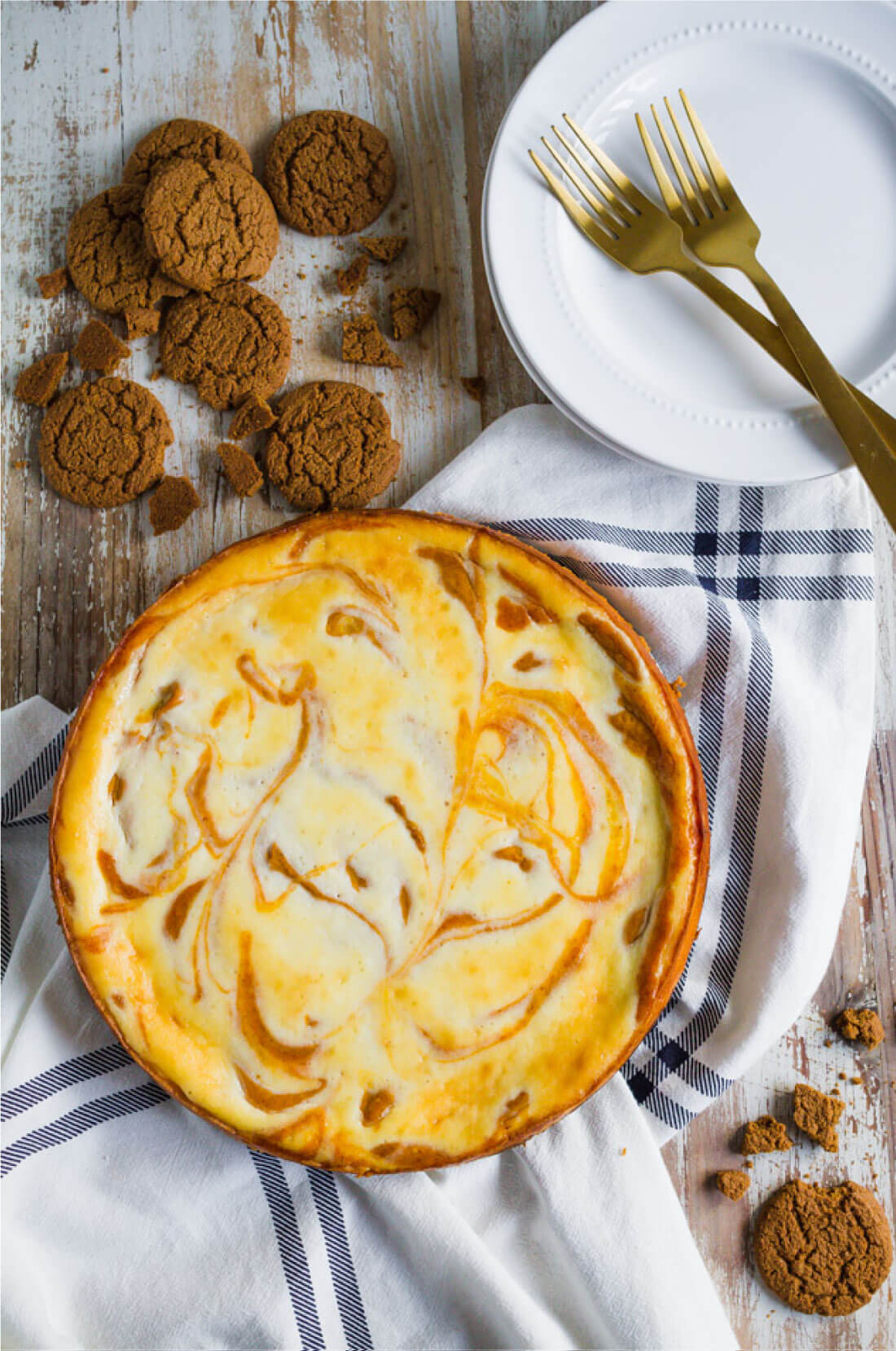 Marbled Pumpkin Cheesecake - this pumpkin cheesecake recipe has a little bit of a kick to it. So good!! via www.thirtyhandmadedays.com