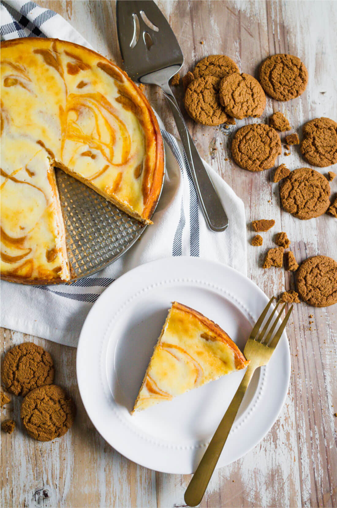 Marbled Pumpkin Cheesecake - this pumpkin cheesecake recipe has a little bit of a kick to it. So good! via www.thirtyhandmadedays.com