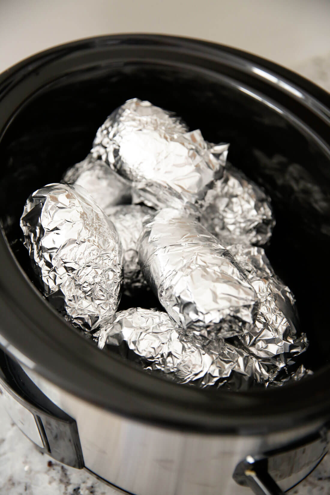 Using the Crockpot for Baked Potatoes from www.thirtyhandmadedays.com