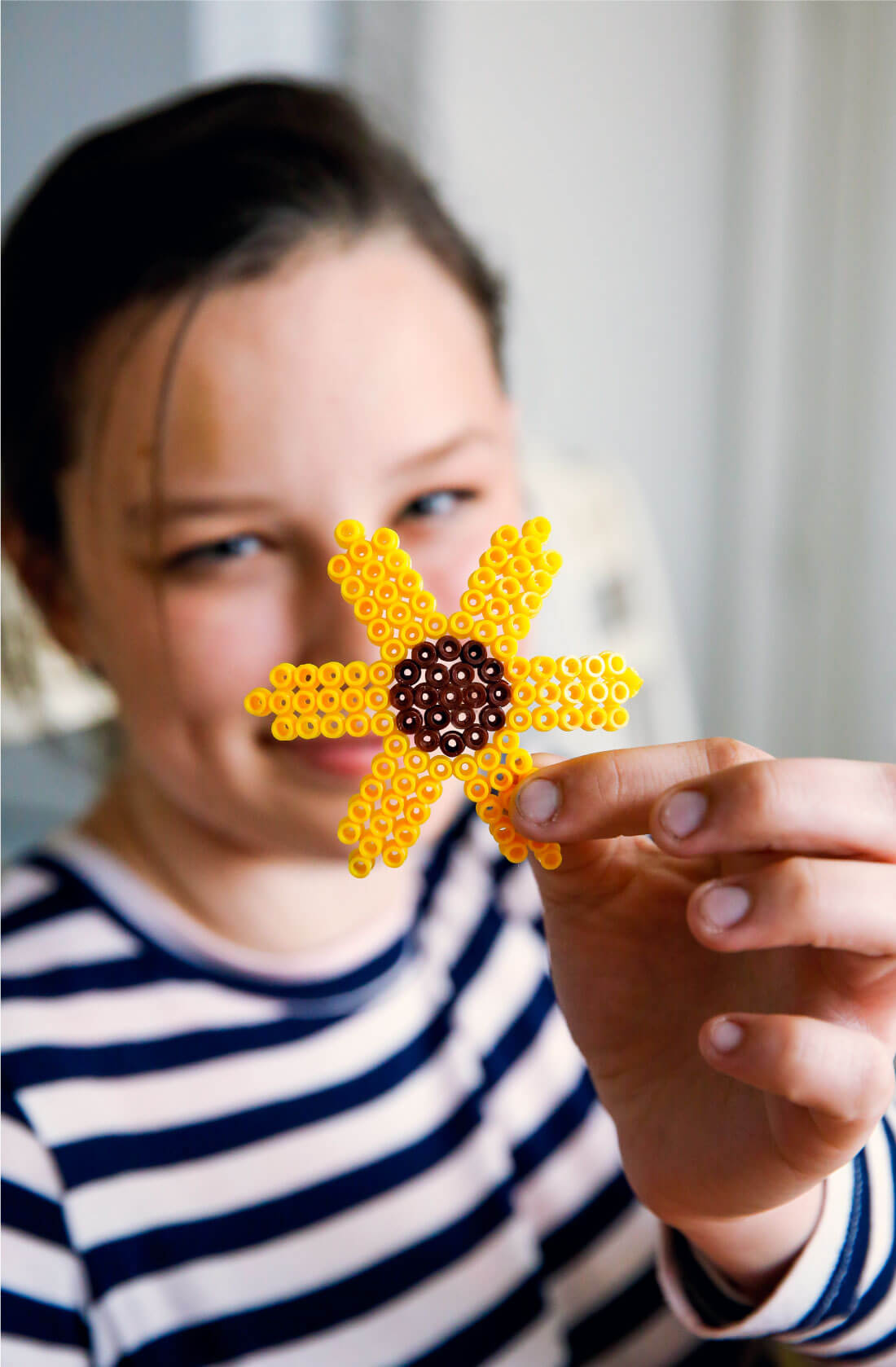 Let's play for change - an awesome Ikea campaign to encourage play. We loved playing with Perler Beads. Julia made a sunflower. www.thirtyhandmadedays.com