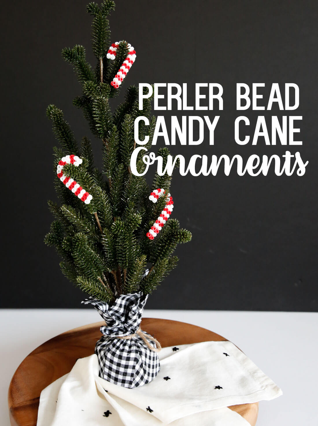 DIY Ornaments made with perler beads. Make these cute candy cane ornaments! www.thirtyhandmadedays.com