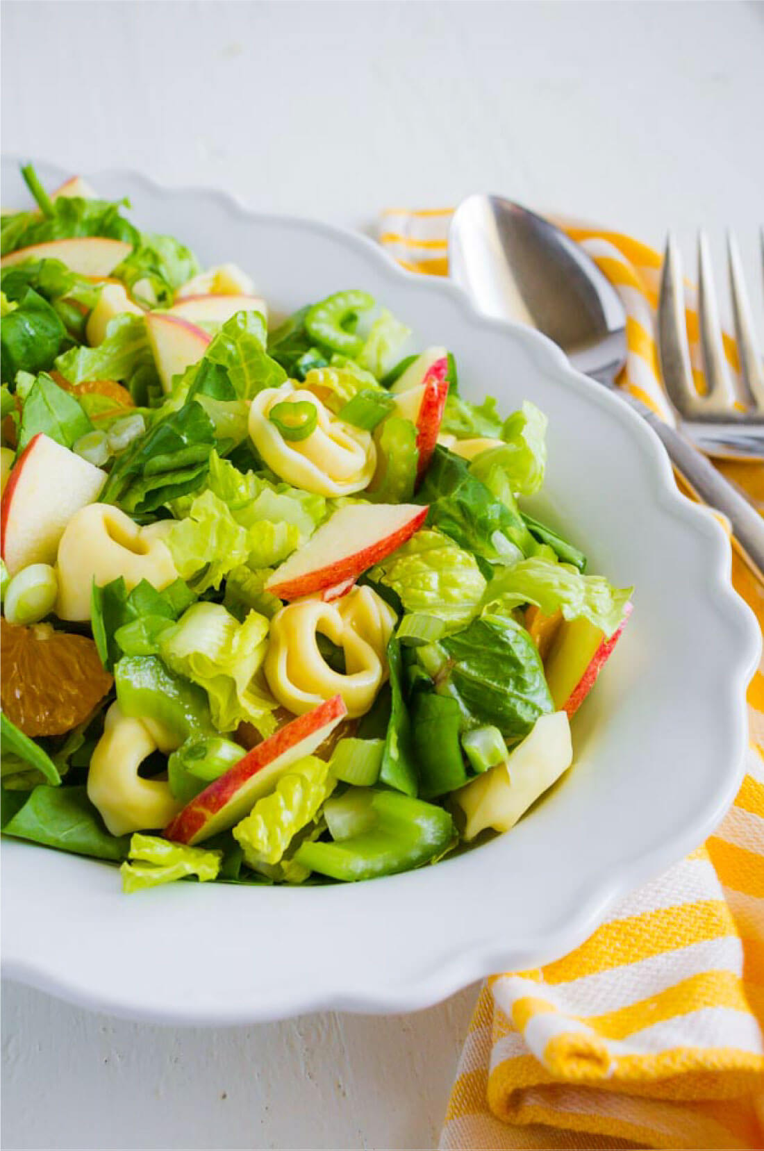 Tortellini Salad - a different take on salad! It has all kind of good ingredients in it. Full bowl of salad.