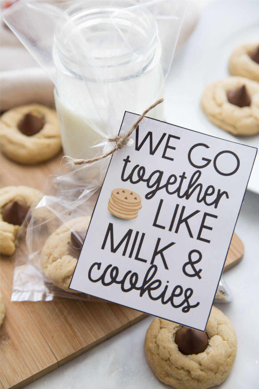 Peanut Butter Blossoms - super easy to make but oh so good. You'll love this cookie recipe! Attach cute tags and deliver to friends. 