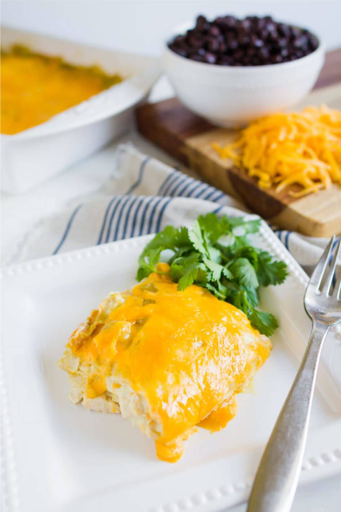 Green Chile Chicken Enchiladas - an easy dinner recipe that your whole family will love! www.thirtyhandmadedays.com