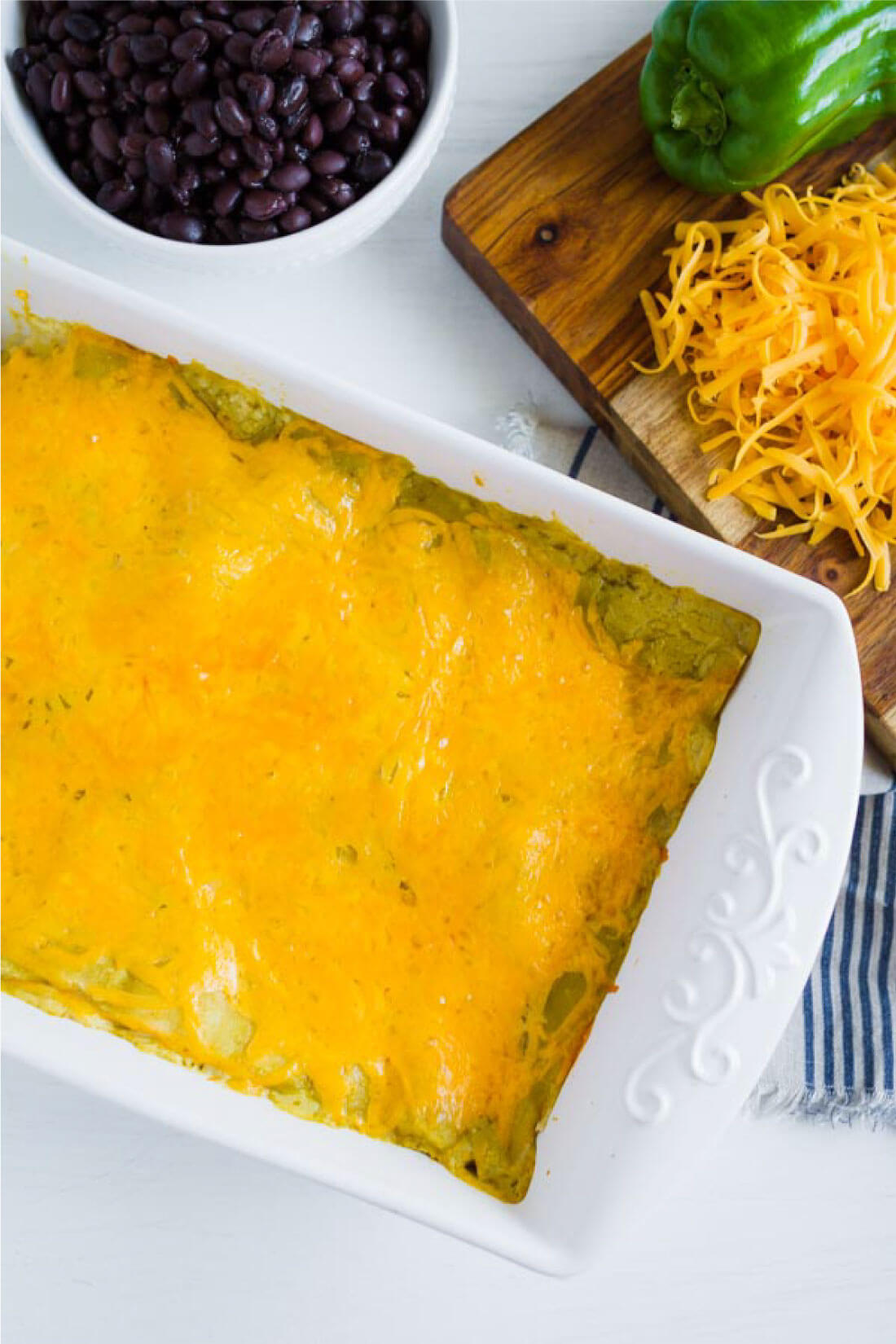 Green Chile Chicken Enchiladas - an easy dinner recipe that your whole family will love! Whole pan