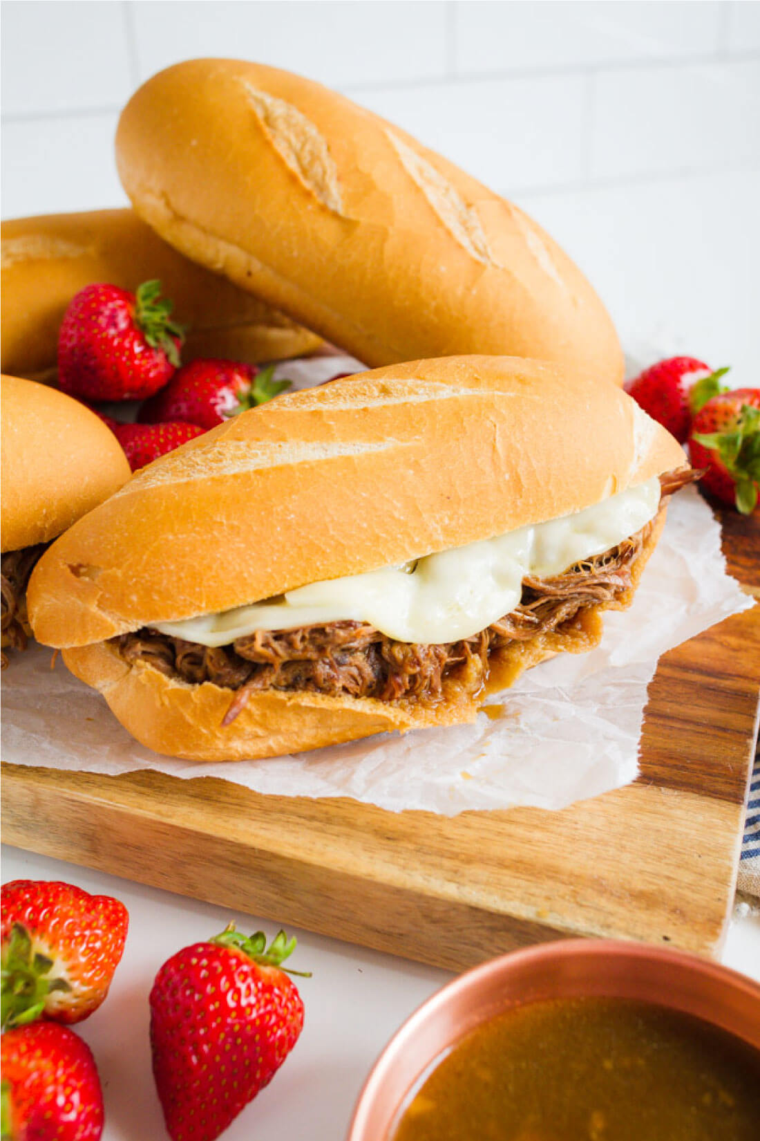 French Dip sandwiches with au jus sauce is the perfect comfort food that can be made in the slow cooker. www.thirtyhandmadedays.com